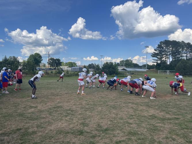 The Patriots close out practice with a full scrimmage, the offense and defense competing against each other. (Hank Tatum/The Oglethorpe Echo)