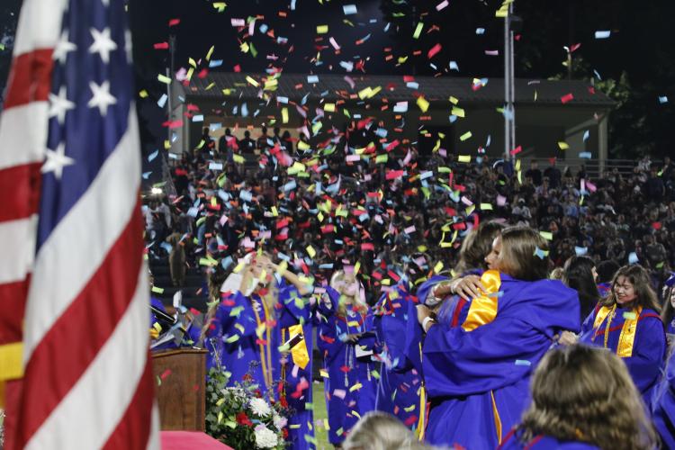 Confetti fills the sky as Oglethorpe County High School graduates of the Class of 2024 celebrate and embrace following the conclusion of the ceremony on May 24. There were 154 graduates in this year’s class. (Torin Smith/The Oglethorpe Echo)