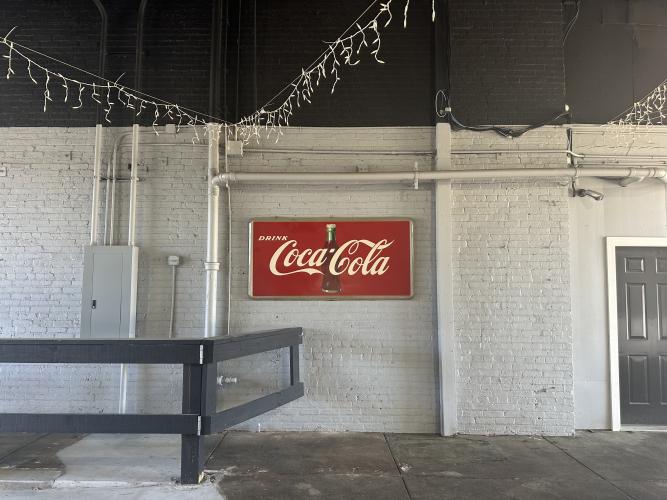 The drive-thru at G Brand BBQ sits in the bag of the restaurant. Between the lights and the vintage sign, it has become a big hit. (Lily Murphy/Oglethorpe Echo)