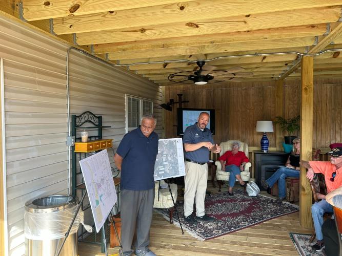 Jay Muthusami (left) and Ben Black (right) present maps for the proposed quarry on Lexington-Carlton Road. Muthusami and Black took questions from neighbors of the proposed quarry and other Oglethorpe County residents on May 23 at Town and Country Kafe. (Zeke Palermo/The Oglethorpe Echo)