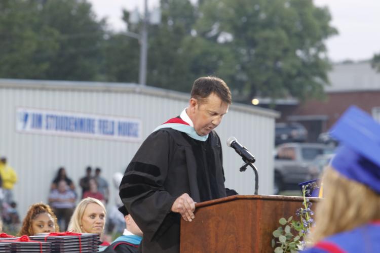 Bill Sampson delivers his speech during the OCHS graduation ceremony on May 24. This was the first senior class to graduate while he was principal at the school. (Torin Smith/The Oglethorpe Echo)