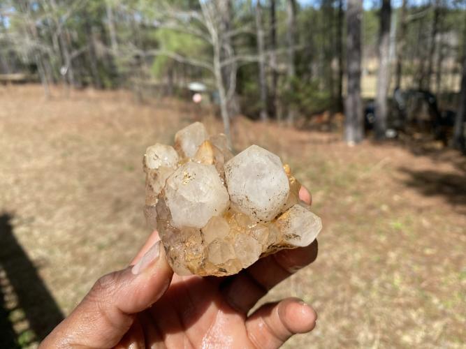 Ron Brown holds a quartz cluster, which is a prevalent crystal in the area. (Submitted photo)