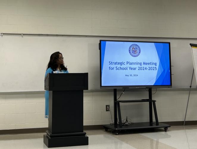 Kanya Cornish, assistant superintendent, presented the school system's beliefs, vision, and the mission “excellence for every student everyday.” (Sarah Coyne/The Oglethorpe Echo)
