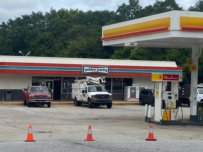 The parking lot of the Golden Pantry in Lexington was closed off Monday as workers evaluated the damage caused when lightning hit the store on Friday, July 19. The store reopened Wednesday morning. (Dink Nesmith/The Oglethorpe Echo)