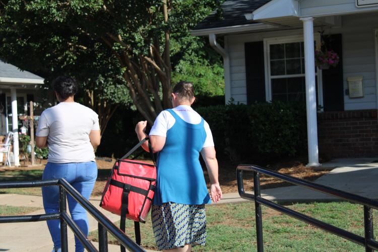 “You know I love you,” was overheard as York dropped off her first meal of the day to Annie Carr, Crawford resident. Amanda York and Delsia Summerall followed their Tuesday driving schedule to help deliver meals within and hour and a half time frame. (Sarah Coyne/The Oglethorpe Echo)