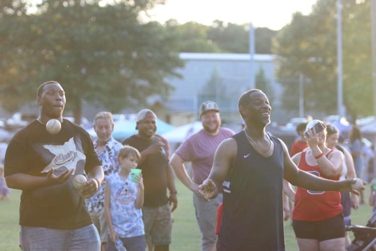 KB Bonds (left) and Patrick Bonds (right) take a turn trying to dunk sergeant Andrew Brooks of Oglethorpe County Sheriff's Office. (Torin Smith/The Oglethorpe Echo)