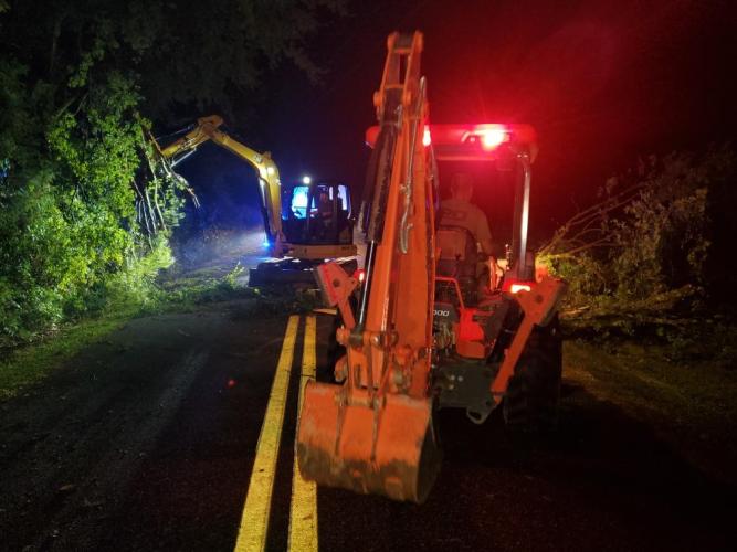 Crews from Rayle EMC, Georgia Power and the county’s public works department began the clean up after the storms downed trees and power lines on Monday night. (Adam Nation/For the Oglethorpe Echo)