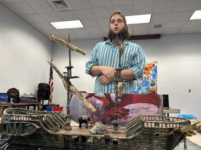 Trey Miller speaks to four players in his Dungeons &amp; Dragons game held at the Oglethorpe County Library. The library will hold its final D&amp;D session of the summer at 11 a.m. on July 20. (Zeke Palermo/The Oglethorpe Echo)