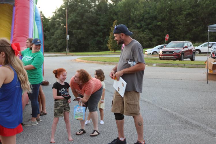Students, parents, residents and vendors packed into the Oglethorpe Middle School cafeteria on Saturday. Organizer Jeanne Jones estimated over 500 attendees at this year's Community Day. (Torin Smith/The Oglethorpe Echo)