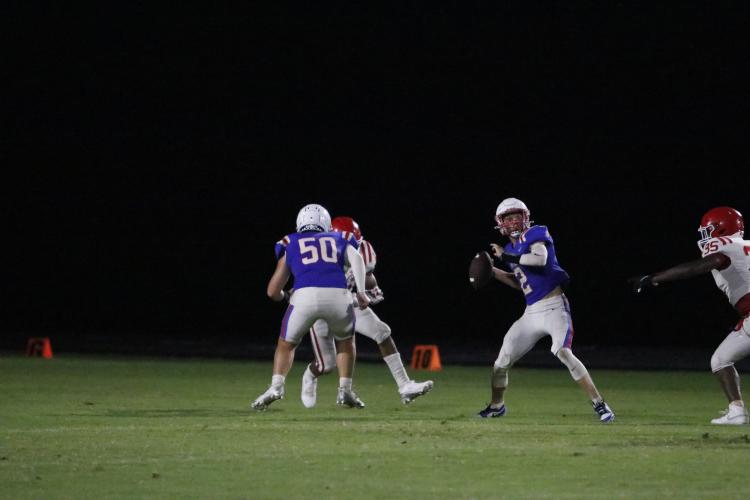 Sophomore quarterback Hunter Hall launches a pass during Friday’s scrimmage loss to Lincoln County. Hall threw a touchdown pass to Darius Heard in the game. (Torin Smith/The Oglethorpe Echo)