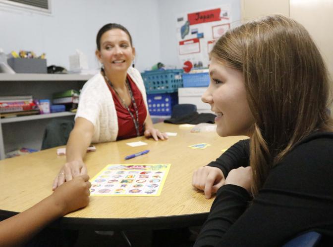 Sophia Wilson (left) interns with Caroline Paradise (right), a speech pathologist at OCES, during the school day as part of the work-based learning program. This wasn’t possible until the board of education approved all periods to be used for work-based learning. (McCain Bracewell/The Oglethorpe Echo)