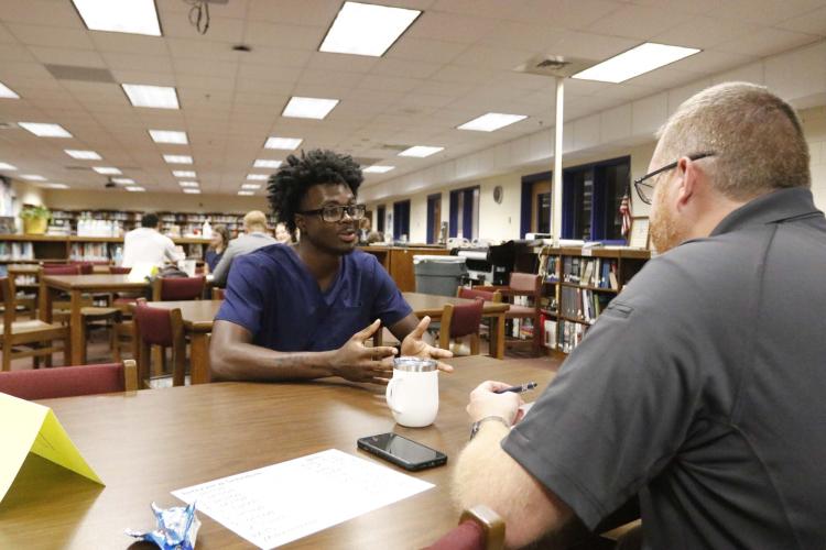Darius Heard sits for a mock job interview with Oglethorpe County EMS paramedic Josh Robinson at Oglethorpe County High School on Wednesday, Sept. 4, 2024. (McCain Bracewell/The Oglethorpe Echo)
