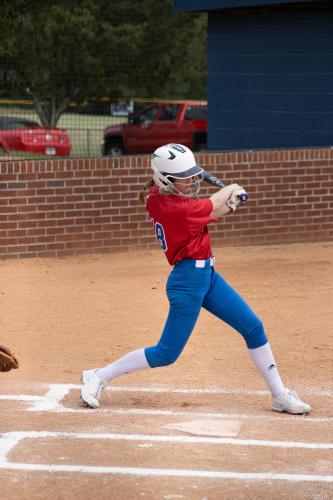 Oglethorpe County sophomore Tristin Caldwell takes a cut during a game against Commerce on Sept. 17. OCHS is competing in a new region, Region 8-A Division I. (Audrey Pfitzner/The Oglethorpe Echo)