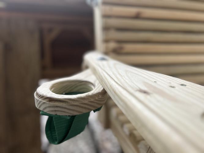 A custom-made cupholder is included in a recent swing order. Ross Dudley began teaching himself about woodworking technique during his time with the Athens Clarke-County fire department. (Chloe Beaver/The Oglethorpe Echo)