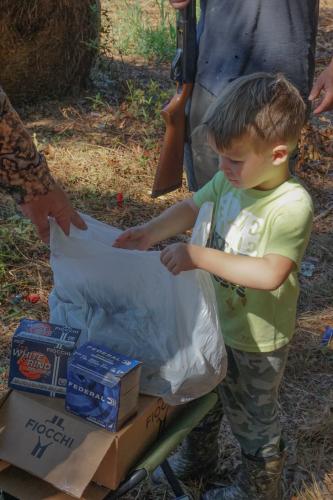 Jensen Bennett helps bag a dove on opening day. (Alex Perri/The Oglethorpe Echo)