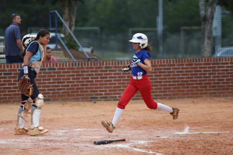 Emily Wisham scores in the Oglethorpe County softball team’s 8-7 victory over Providence Christian on Aug. 29. Lillie Anderson went 3-for-3 with three RBIs in the victory. (TY JOHNSTON/THE OGLETHORPE ECHO)