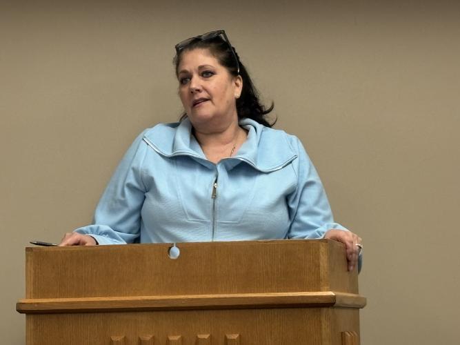 Faith Campbell thanks the Oglethorpe County Board of Commissioners for withdrawing an amendment to the county's animal ordinance on Sept. 9. The BOC agreed to try to work out a deal with MOAS. (Photo / Andy Johnston)