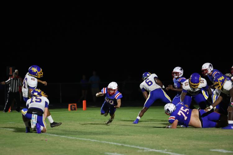 Keagan Moats attempts to block a kick on Aug. 30. Washington-Wilkes kicked a last-second field goal to defeat the Patriots 20-17. (TY JOHNSTON/THE OGLETHORPE ECHO)