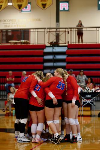 OCHS volleyball players gather during a match at North Oconee on Sept. 5. The Patriots are off to a 2-0 start in Area 8-A. (TY JOHNSTON/THE OGLETHORPE ECHO)