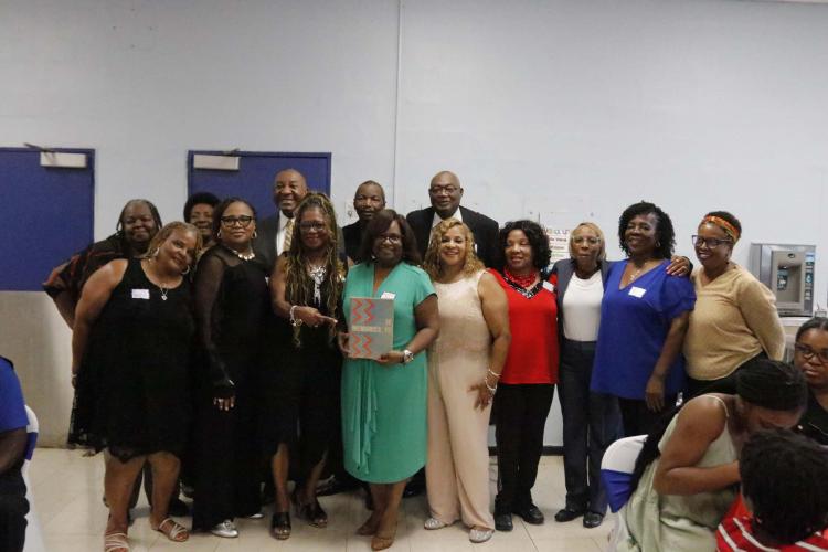 Members of the 1975 Oglethorpe County High School graduating class pose at the commemorative program for the Oglethorpe County Consolidated School, which is now Oglethorpe County Primary School, on Saturday, Sept. 28, 2024. The consolidated school opened in 1955 for African American students during segergation. OCPS is scheduled to be torn down in phase two of the new Oglethorpe County Elementary School construction. (McCain Bracewell/The Oglethorpe Echo)