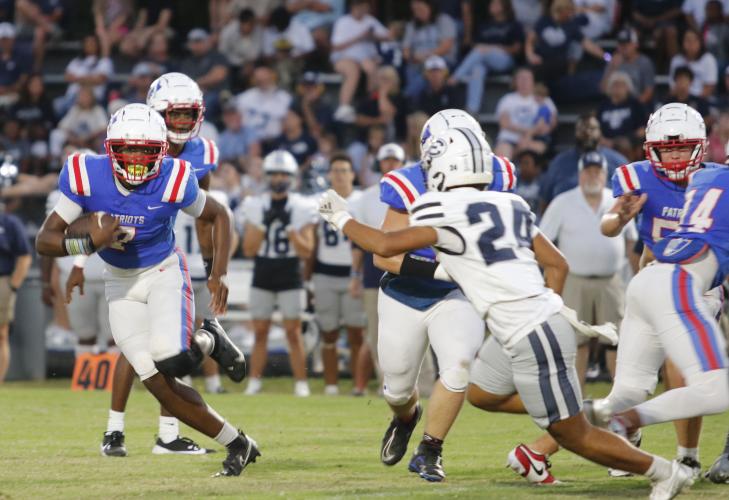 Payton Prince runs for yardage during Oglethorpe County's game against Elbert County on Sept. 20. Prince has been one of the key players in the Patriots’ running attack this year. (MCCAIN BRACEWELL/THE OGLETHORPE ECHO)