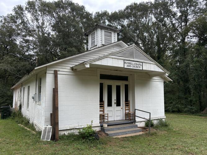 Aimee Wheeler and Frankie Hart plan to turn this church building in Lexington into a three-bedroom home. Russell Chapel AME Church has been closed for about 10 years. (ANDY JOHNSTON/THE OGLETHORPE ECHO)