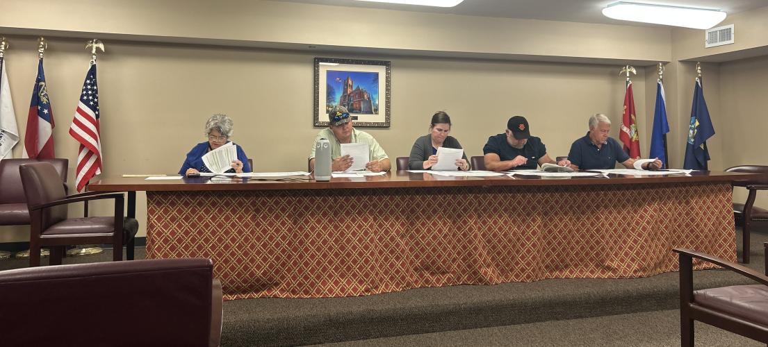 Oglethorpe County zoning board members Janet Hill (from left), JF Hansford, Morgan Robinson, Robert Drew and Jimmy Shealy call the September zoning board meeting to order. The board discussed a request to subdivide land on Morgan Road in Comer. (Chloe Beaver/The Oglethorpe Echo)