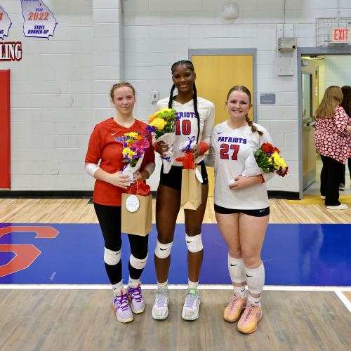 OCHS volleyball players Samantha Amos (from left), Kenzie Henderson and Sofia Horsley were honored on senior night on Tuesday. The Patriots defeated Athens Academy to win their eighth consecutive match. (Ty Johnston/The Oglethorpe Echo)