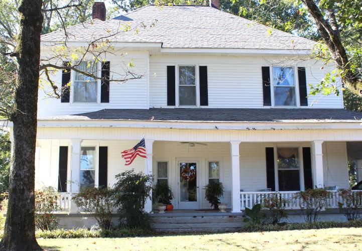 The NeeSmiths’ home at 355 Comer Road features Colonial Revival architectural elements. The home is 4,208 square feet and includes five bedrooms and three bathrooms. “My brother lived (in Lexington), and we called him and told him that we wanted to move back there and we were looking for a place where we wanted some acreage, and he knew about this place for sale,” Rosa NeeSmith said. (Emily Slepsky/The Oglethorpe Echo)