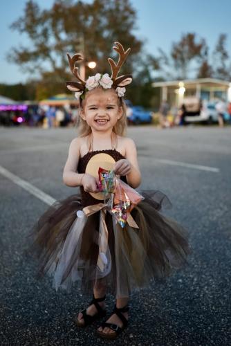 Three-year-old Hadlee Mac’s smile says it all when it comes to her opinion on the Oglethorpe County rec center’s eighth annual trunk or treat event. The little deer began the night shyly, but once that bag of candy was in her hand, she was ready to show it off to everyone around. (Saylor Williams/The Oglethorpe Echo)