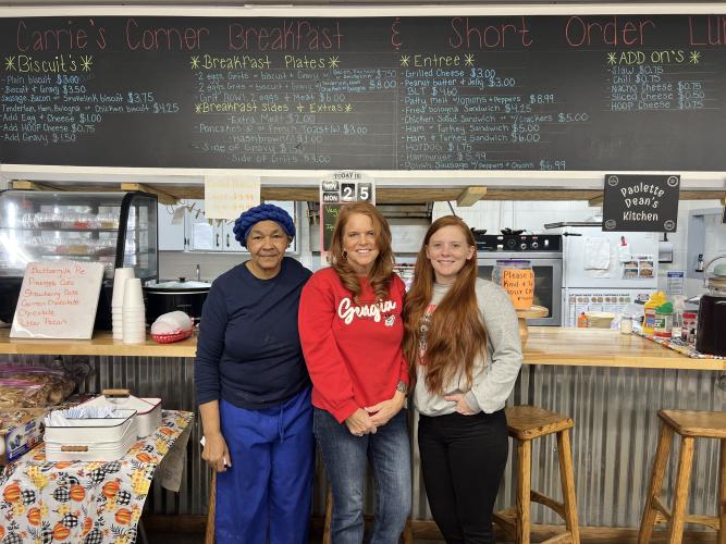 Paulette Cade (from left), Carrie Faris and Brittany Locke are a part of the team behind Carrie's Corner Store &amp; Cafe, which has been open since 2022. Faris and her daughter Locke run the store while Cade comes up with the hot special menus and prepares the food. (Ella Kroll/The Oglethorpe Echo)