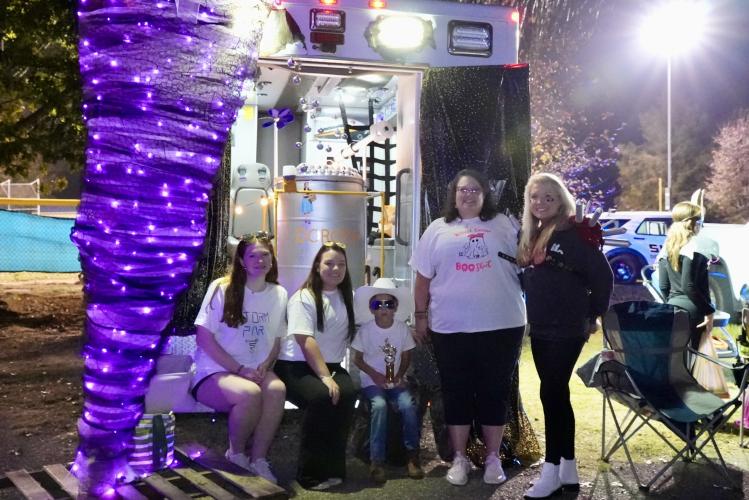 The Noltensmeier family won the trunk decorating contest with their “Twisters”  inspired ambulance. Oglethorpe County EMS provided the ambulance and SJ Noltensmeier provided the theme. “The inspiration is the 7-year-old who wanted to be  Glen Powell,” Taylor Noltensmeier, SJ's mom, said. (Saylor Williams/The Oglethorpe Echo)