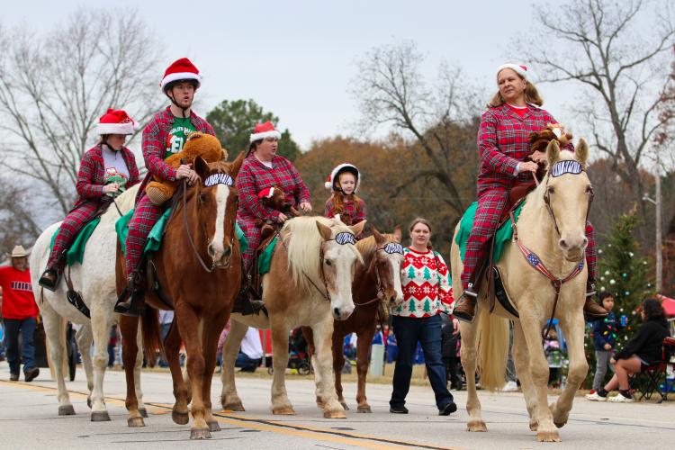 The Echo Hill riders trot out in front of Santa’s float in the 4th annual Maxeys Christmas parade, Saturday, Dec. 3, 2022. They took home the first place award for their costumes, and their horses matching ones. (Submitted Photo/Aisha Schulz)