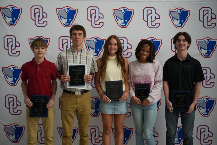 The cross country team award winners (from left): John Adams (The Patriot Award), Cory Tillman (Most Valuable Runner), Elin Turner (The Patriot Award), Sydnie Henderson (Most Valuable Runner) and Luke Holbrooks (The Patriot Award).  (Saylor Williams/The Oglethorpe Echo)