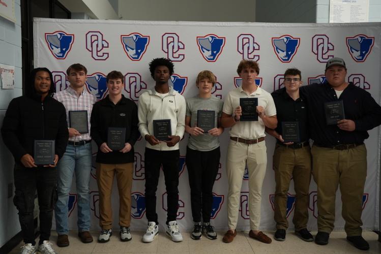 The football award winners (from left): Jordan Johnson (Pride Award), Dalton Hilley (Varsity Defensive Player of the Year), Bryce Frankel (Commitment Award), Darius Heard (Varsity Offensive Player of the Year), Hayden Williams (JV Offensive Player of the Year), Jackson Tatum (Discipline Award), Braxton Edmonson (Special Teams Varsity Player of the Year) and Reid Coley (Five Pillar Award).  (Saylor Williams/The Oglethorpe Echo)