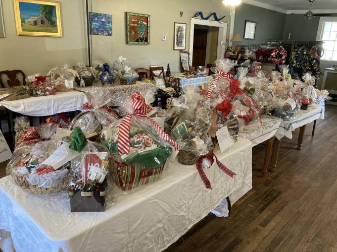 More than 75 gift baskets were for sale at the fourth annual Christmas Bazaar and Book Sale on Dec. 7 at No. 3 Railroad St. The bazaar raised more than $2,500 that will go to the Oglethorpe County Library. (Submitted Photo)