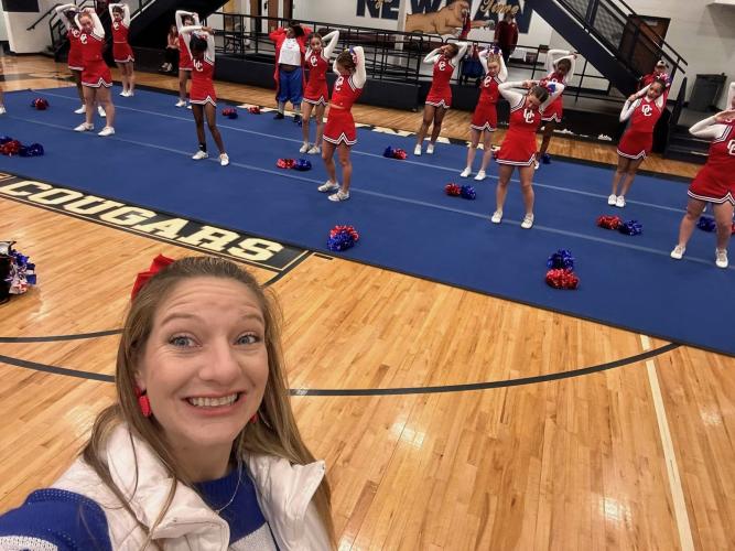 OCHS cheerleading coach Morgan Williams and her team readies itself for competition. The Patriots finished 16th in the state Game Day competition. (Submitted Photo)