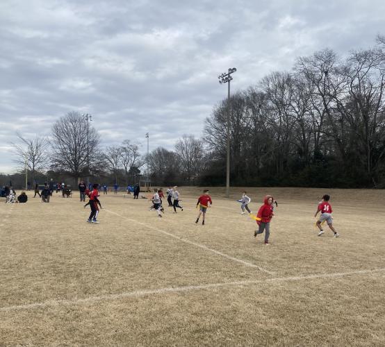 The 10u flag football teams coached by Craig Huling and Shane Brown compete for the league title. Huling's team won the championship with a 23-0 win. (Photo/Anna Izquierdo)