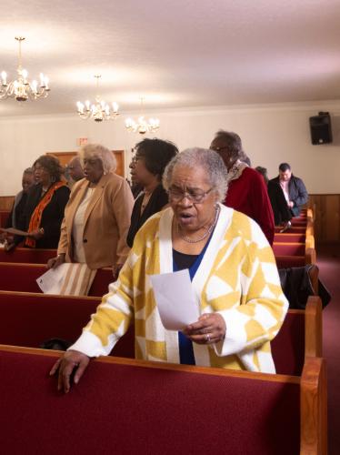 Marie Galham sings a hymn titled "Lift Every Voice and Sing" alongside others attending the annual Dr. Martin Luther King, Jr. Program sponsored by the Concerned Men of Oglethorpe County at Mt. Zion Baptist Church in Stephens, Georgia on Jan. 20, 2025. The annual program first began in 2005 and aims to bring the community and youth of Oglethorpe county together in unity, modeled after the values of Dr. Martin Luther King Jr. himself. (Photo / Lux Corrona)