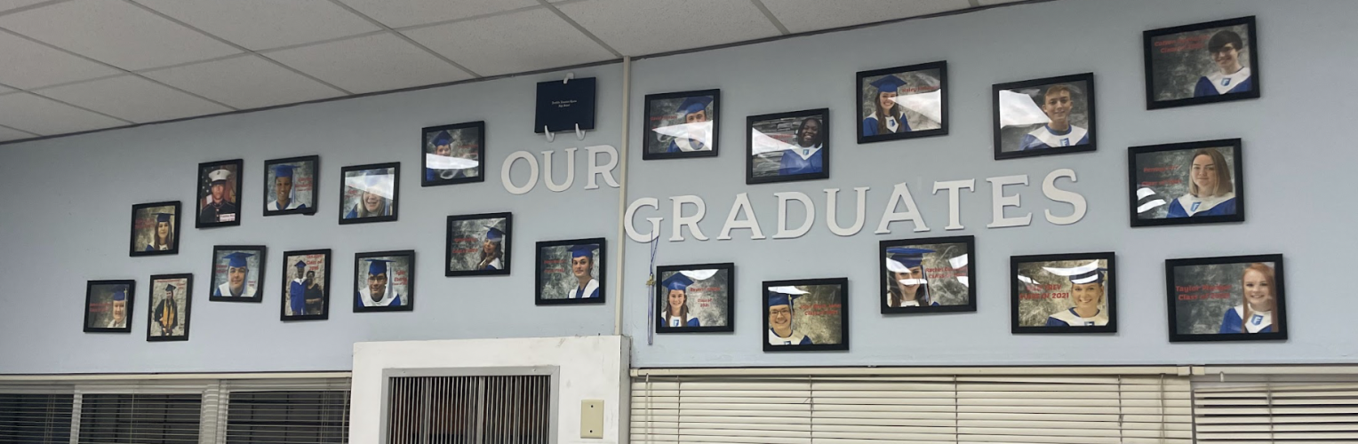 Photos of Oglethorpe County Foothills graduates are on display in an Oglethorpe County Foothills classroom. More than 60 students have graduated from the school since it opened in 2018. (Bridget Goodman/The Oglethorpe Echo)