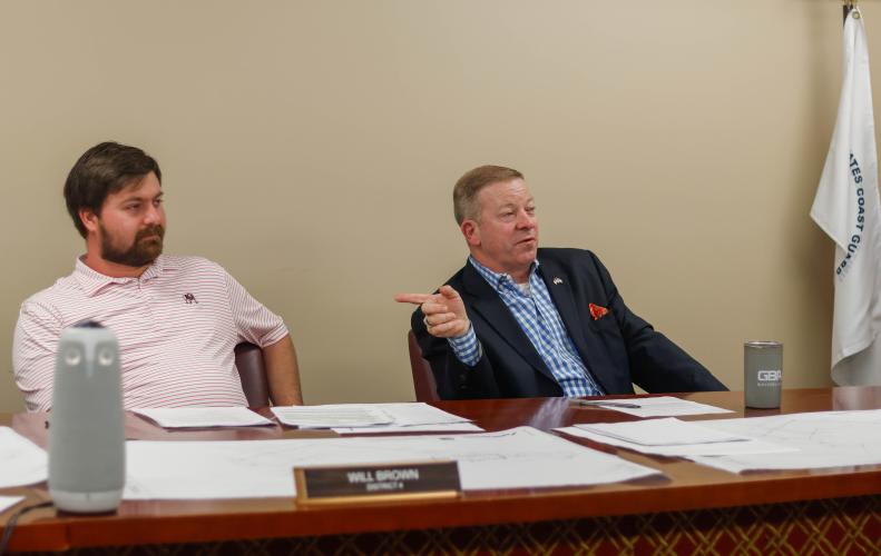Commissioner Tracy Norman (right) responds as fellow commissioner Will Brown looks on during the Oglethorpe County Board of Commissioners meeting on Monday. (Felix Scheyer/The Oglethorpe Echo)
