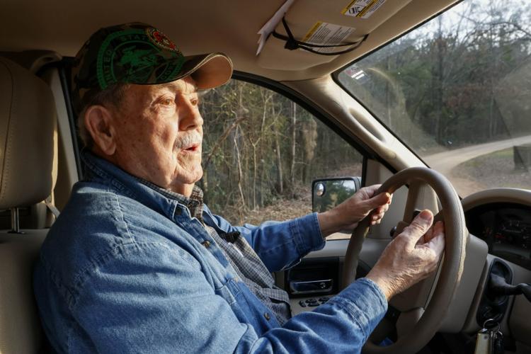 Randy Gordon, a resident of Oglethorpe County’s Almond Drive, drives his car down Almond Drive on Wednesday, Feb. 5, 2025. “I don't like city life. Never have,” Gordon said, while describing his relationship with the road and its community over the years. (Photo/Felix Scheyer)