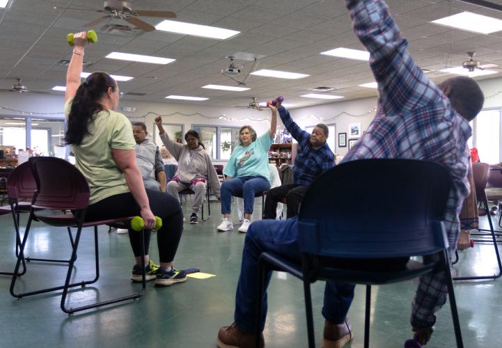 Sarah Baker leads a group of seniors in an exercise routine at the Oglethorpe County Senior Center on Feb. 6, 2025. (Photo / Lux Corrona)