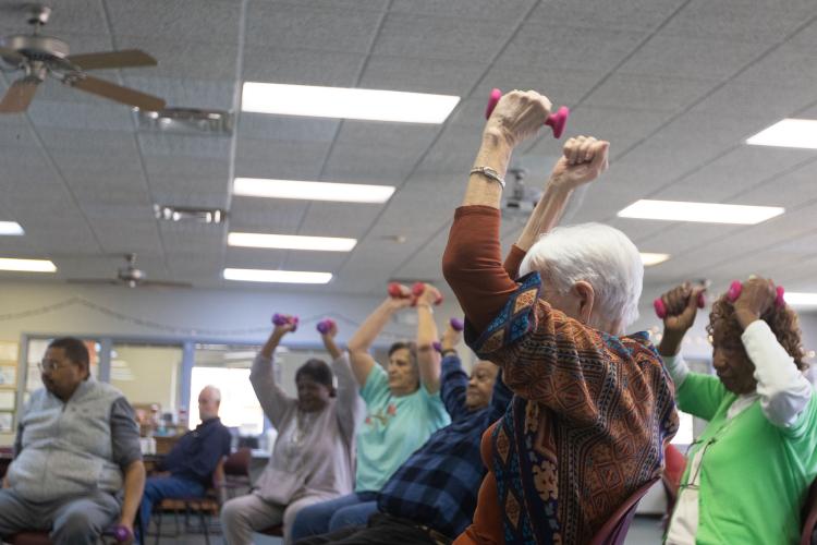 A group of seniors participate in an exercise routine with dumbells at the Oglethorpe County Senior Center on Feb. 6, 2025. (Photo / Lux Corrona)