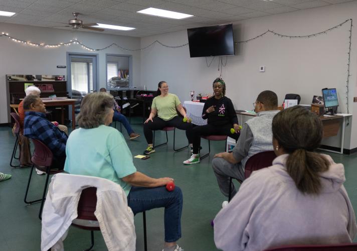 Sheryl Howard joins Sarah Baker in leading an exercise routine at the Oglethorpe County Senior Center on Feb. 6, 2025. Howard is the center's Activity Coordinator. (Photo / Lux Corrona)