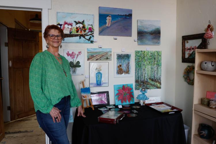 Ruth Jones displayed her artwork in one of Linda Parish’s renovated buildings for First Friday in early February. Parish plans to bring art and antique businesses to the buildings next to The Oglethorpe Echo in downtown Lexington. (Photo/Libby Hobbs)