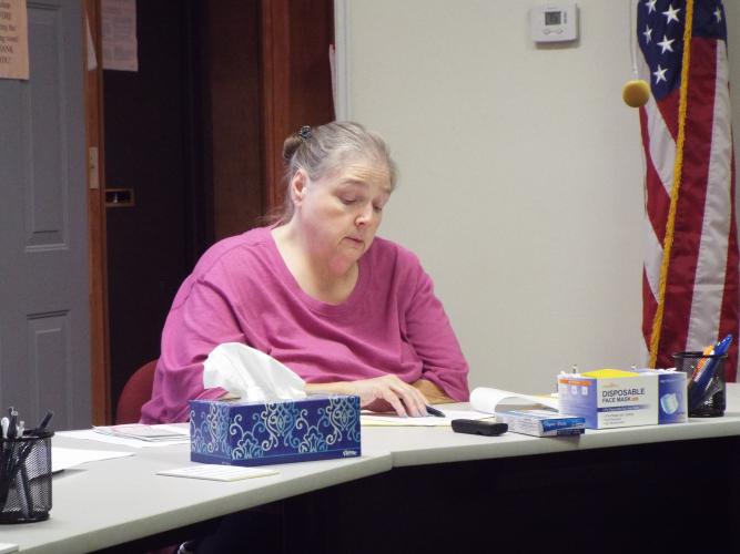 City Clerk Amy Wall-Lance reads the revised procurement policy during Tuesday's Crawford City Council meeting. (Photo/Luis Vaquero)