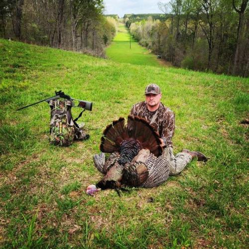 Graham harvests a turkey near a power line in Wilkes County during the 2024 turkey hunting season. He views turkey hunting as a “way of life” and a pastime he hopes to preserve for future generations. (Submitted photo)