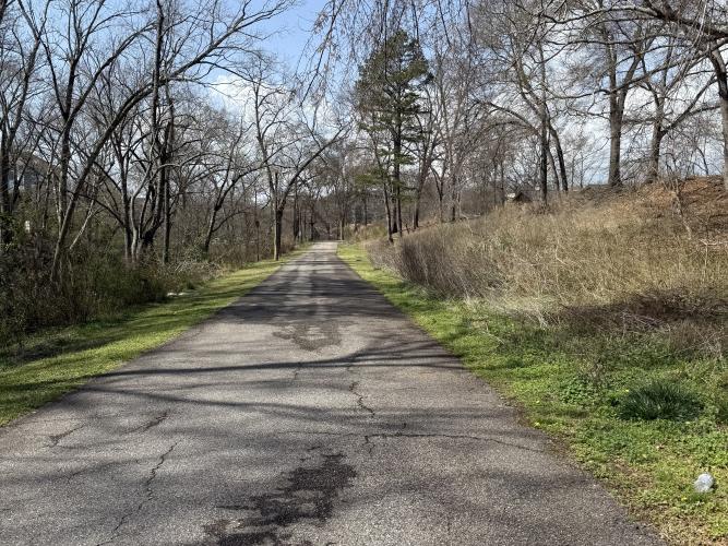 The 1.1-mile paved trail in Athens' Dudley Park is part of the Athens Physical Therapy Ticket to Ride bike race scheduled for Saturday. Bikers often ride along the 1.1-mile portion of the trail. (Photo/Anna Izquierdo)