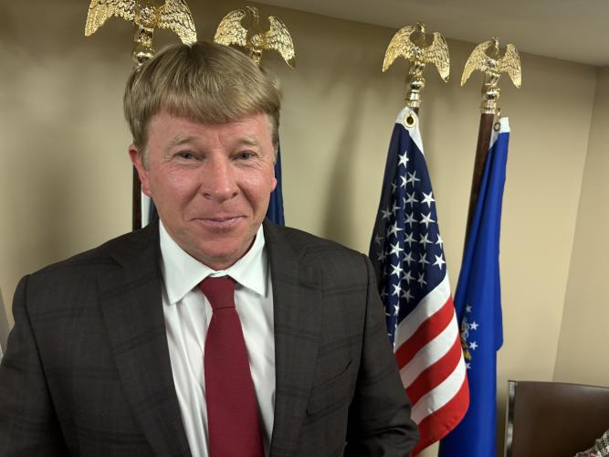 Commission Chair Jay Paul wore a dark red tie during the commission meeting on Monday to commemorate former commission chair Robert Johnson. Johnson gave the tie to successor Billy Pittard, who later gave it to Paul. (DINK NESMITH/THE OGLETHORPE ECHO)
